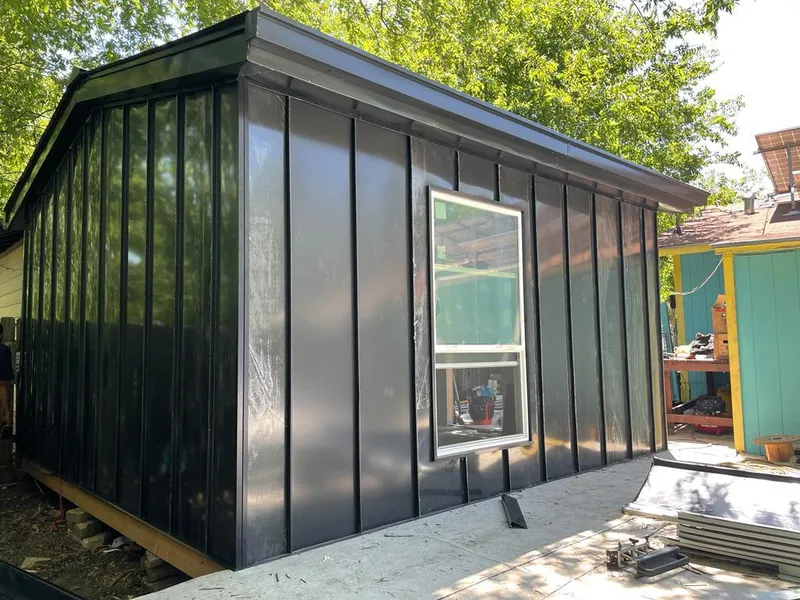 Black standing seam metal wall panels for Roof Inspection in Westview